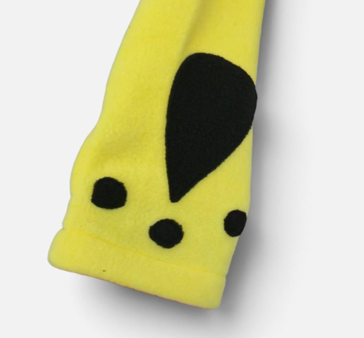 Cupcake Cult Striker yellow hoodie paw print sleeve detail